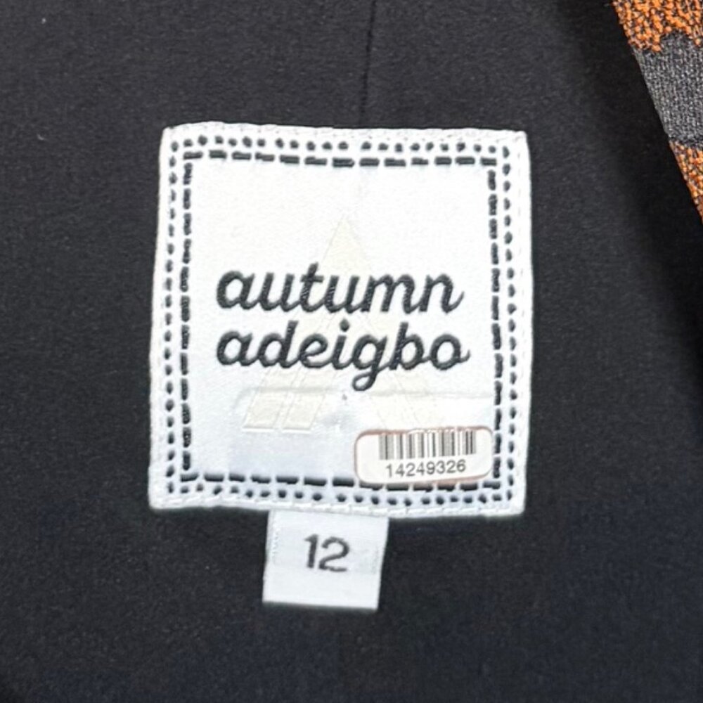 Autumn Adeigbo Cheetah Josephine Peplum Top Size 12 - Picture 5 of 5